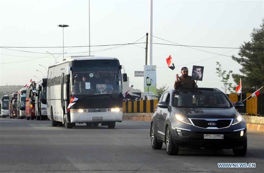 SYRIA-DAMASCUS-LEBANON-REFUGEES-RETURNING