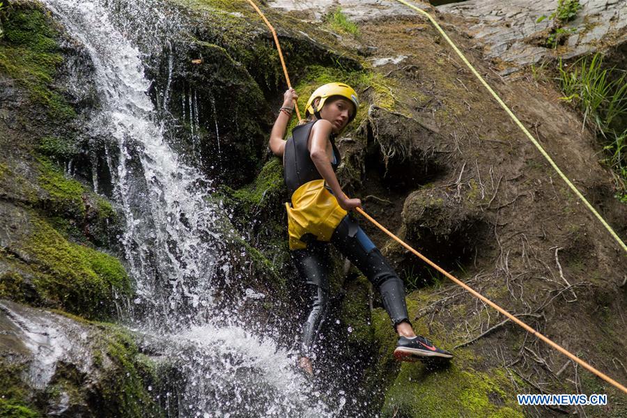 (SP)GREECE-LARISSA-WATERFALL RAPPELLING