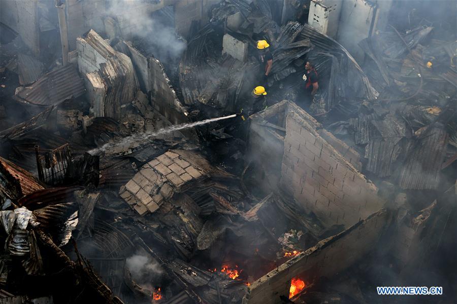 PHILIPPINES-QUEZON-SLUM AREA-FIRE