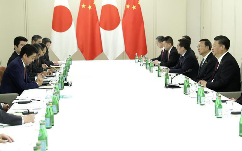 Xi, Abe meet on ties, reaffirm readiness to strengthen China-Japan partnership