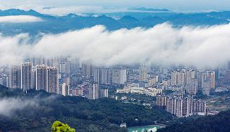 Urban area of Kaili surrounded green plants in SW China's Guizhou