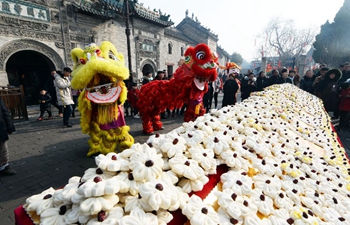 Traditional steamed buns displayed on first day of Lunar New Year in E China's Anhui